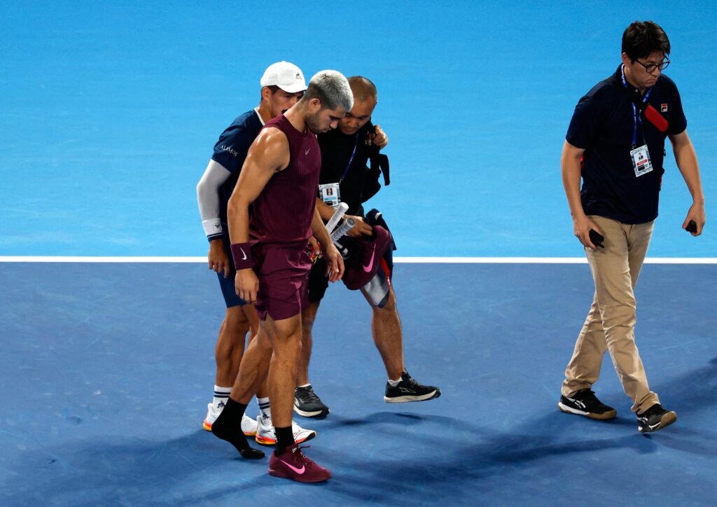 Carlos Alcaraz,Carlos Alcaraz injury 2025,Japan Open 2025,ATP World No.1,Carlos Alcaraz news,Alcaraz vs Báez,Tennis injury updates,Carlos Alcaraz ranking,Tennis tournaments 2025,Alcaraz comeback,tennis,wta