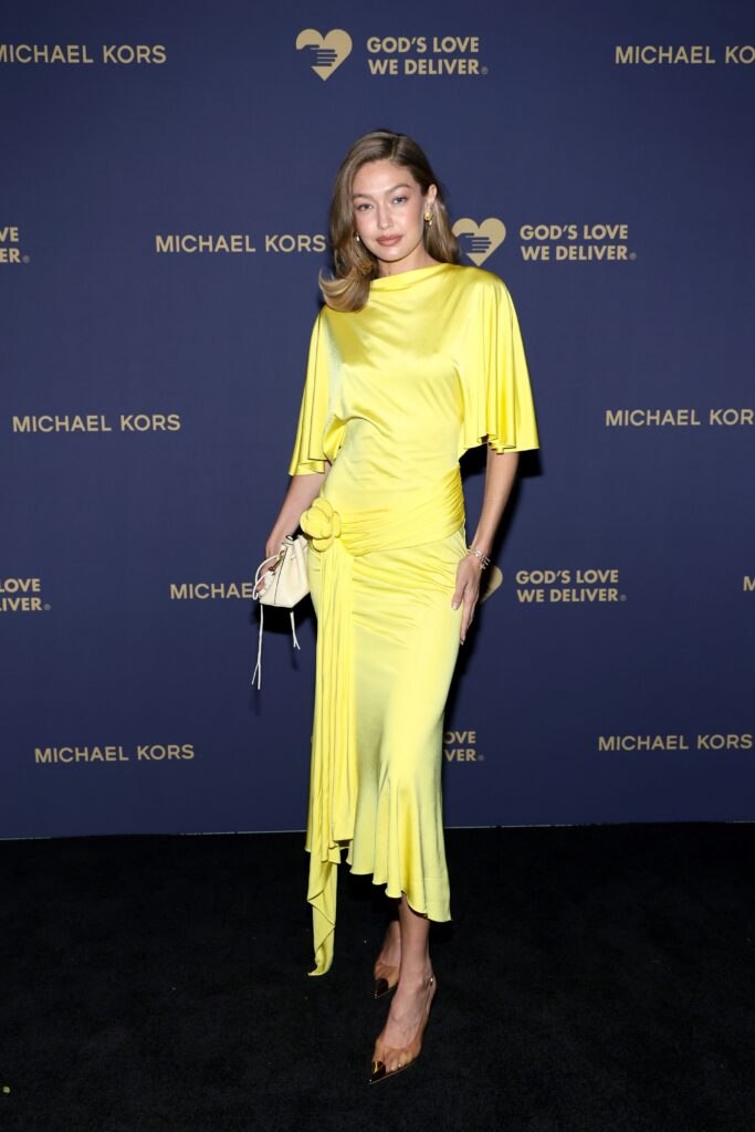 Gigi Hadid showcased her signature style in a sleek, high-fashion ensemble, turning heads on the red carpet.