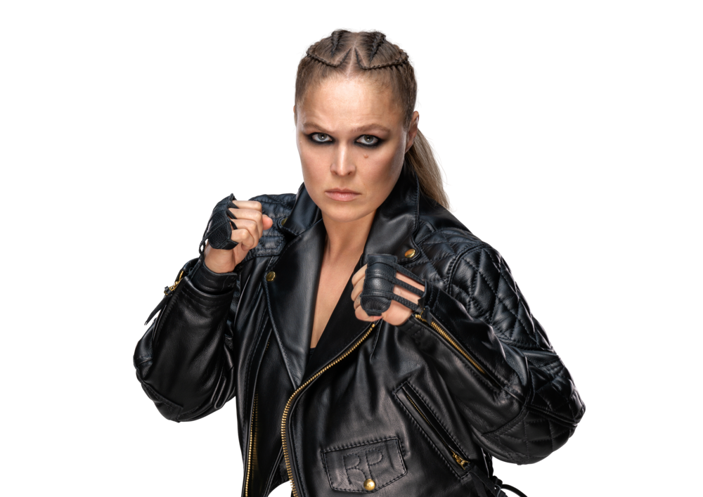Ronda Rousey’s life, Olympic judo career, UFC dominance, WWE journey, and her impact on women in sports.